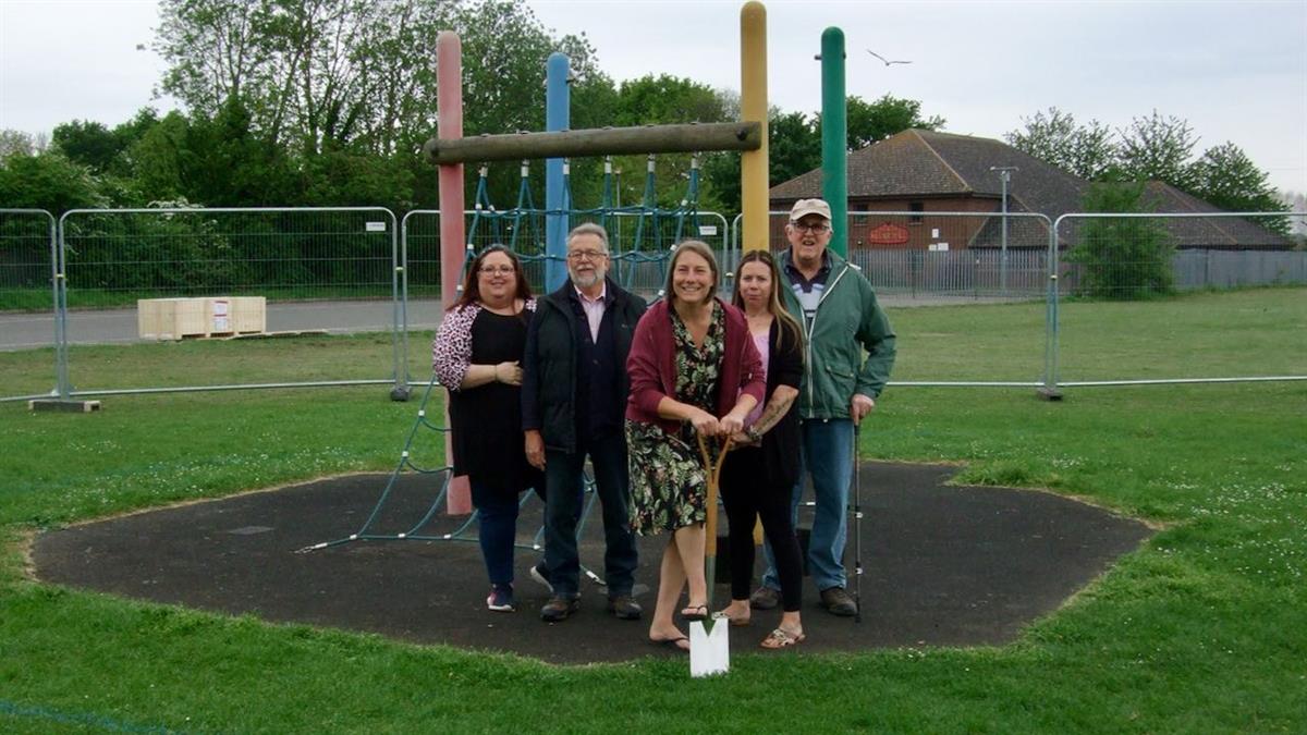 Councillors and neighbours mark the start of the construction of the play equipment