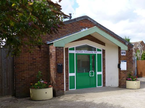 front of the new community hall