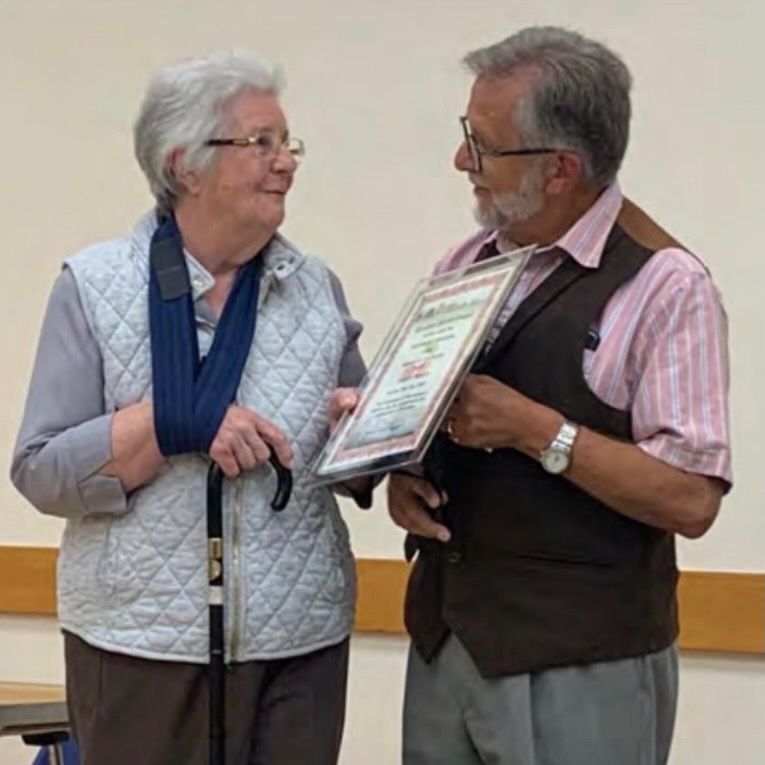 Evelyn Winzar receives freedom of the Parish from Chairman Clive 